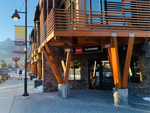 RGO Canmore entrance with a rock façade and cedar wood posts
