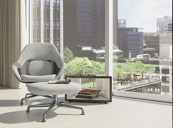 Circular lounge chair and footrest in heather grey